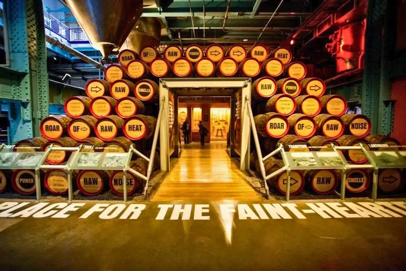 Stacks of wooden Guinness barrels in the 'Place for the Faint-Hearted' room inside the Guinness Storehouse.