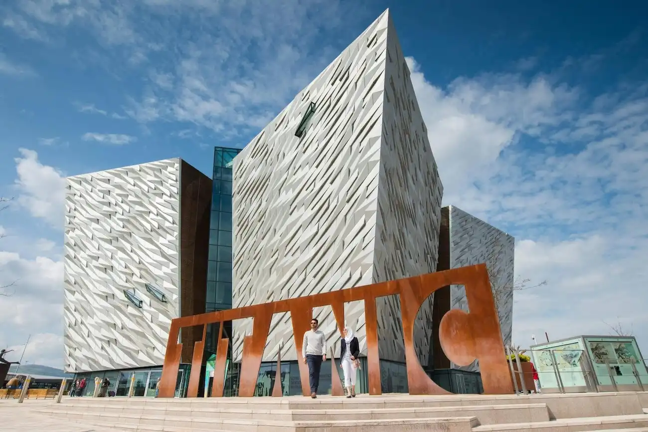 The modern, angular silver exterior of the world-class Titanic Belfast museum building.